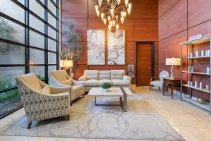 Parie Med Spa luxury waiting area with modern seating and chandelier