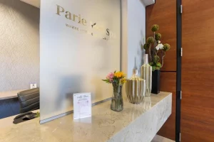 Parie Med Spa reception desk with modern decor and marble counter