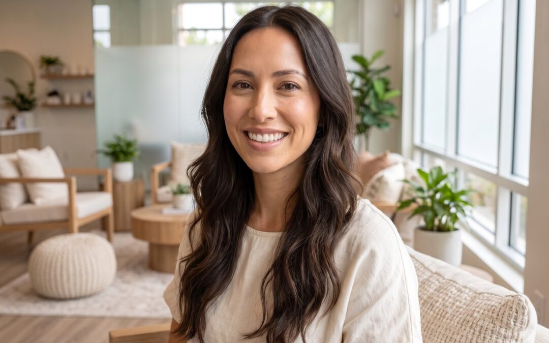 Smiling woman in a linen shirt in a bright spa lounge, model image